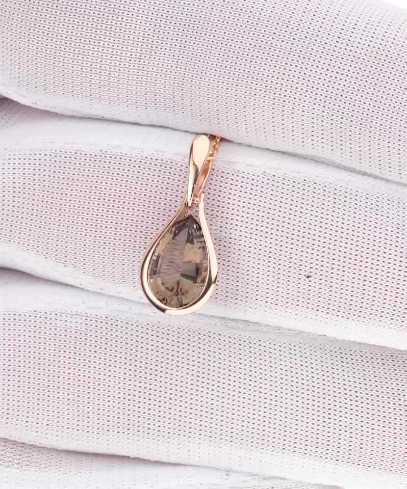 Gold pendant with smoky quartz