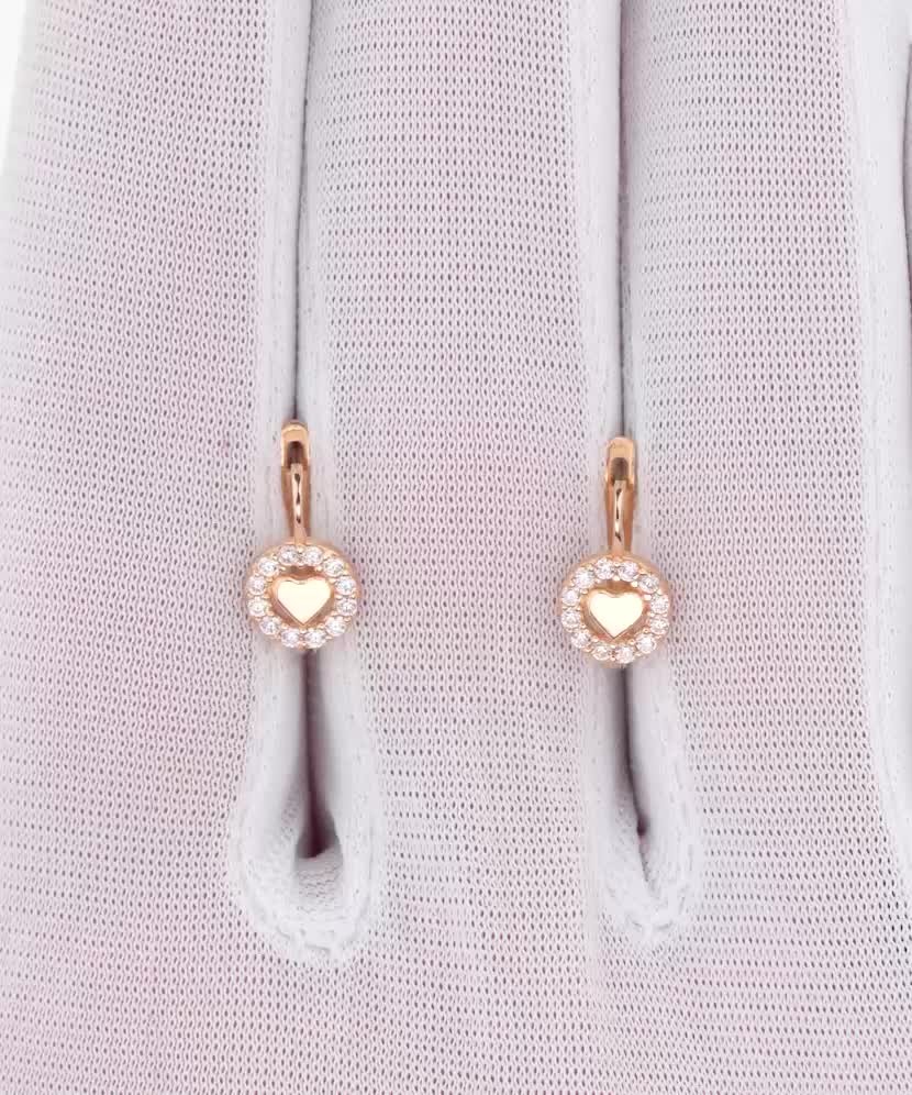 Gold earrings with zircons