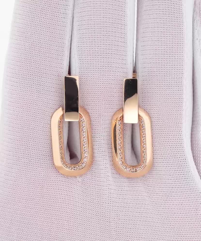Gold earrings with zircons
