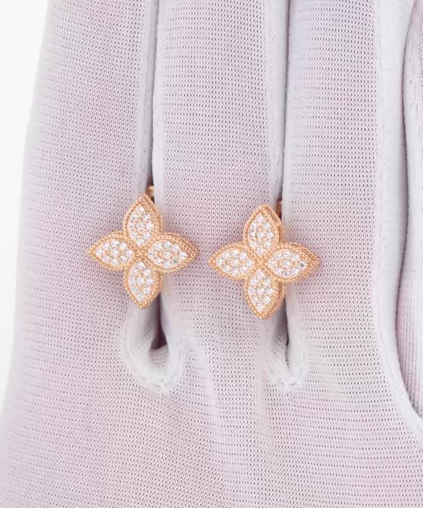 Gold earrings with zircons