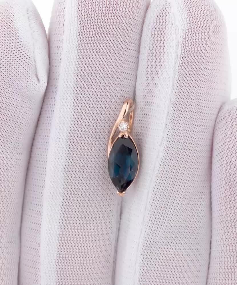 Gold pendant with London topaz and diamond