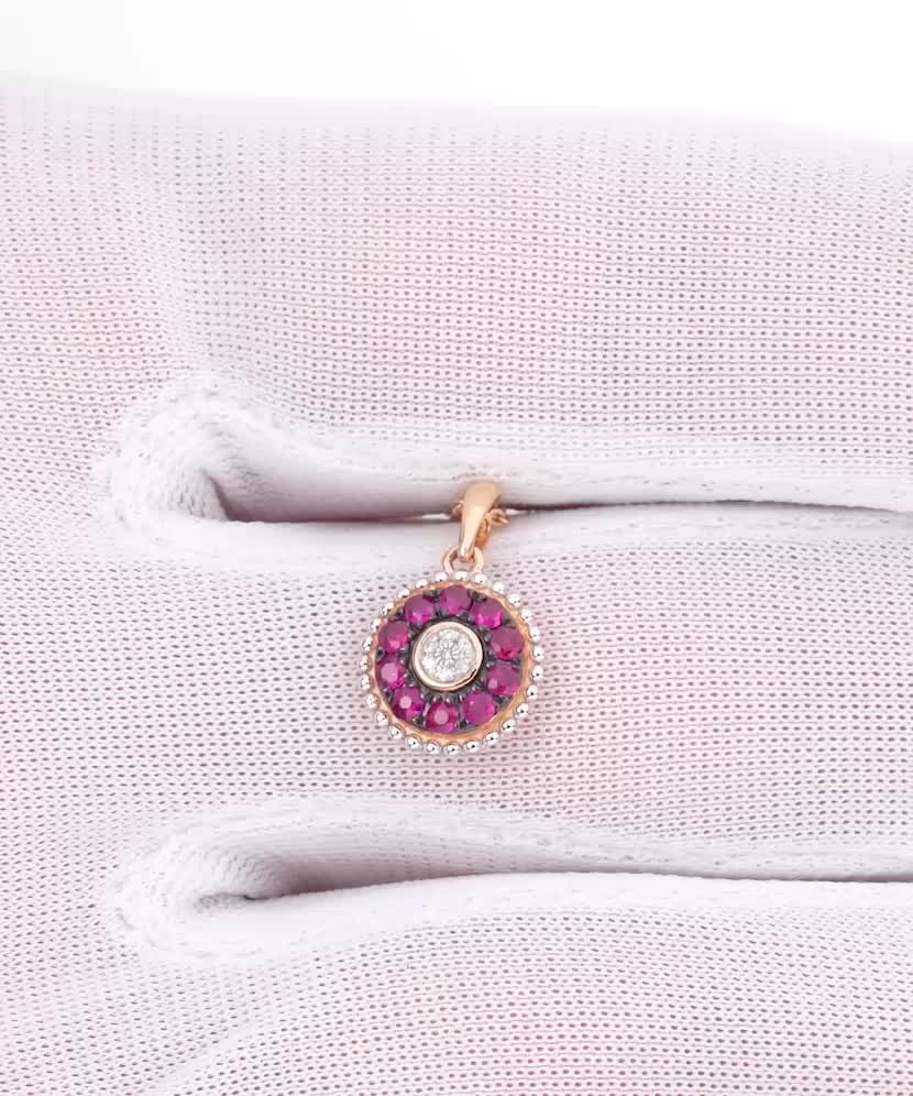 Gold pendant with rubies and diamonds
