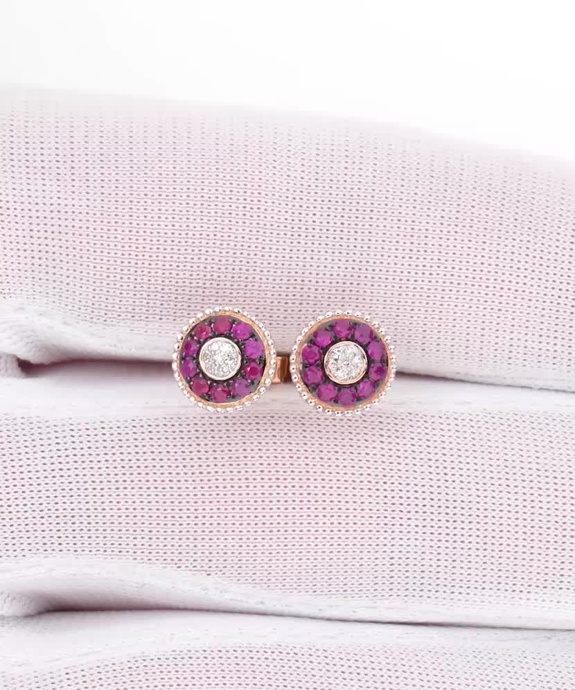 Gold earrings with diamonds and rubies