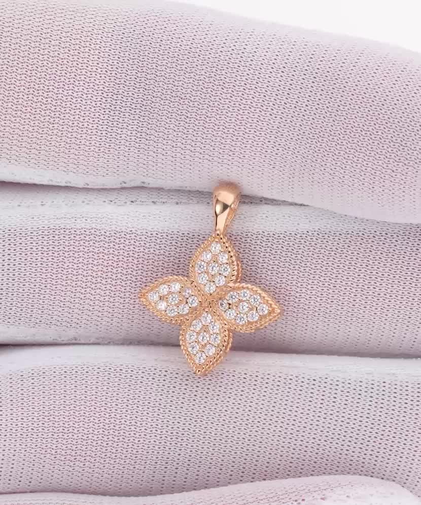 Gold pendant with zircons