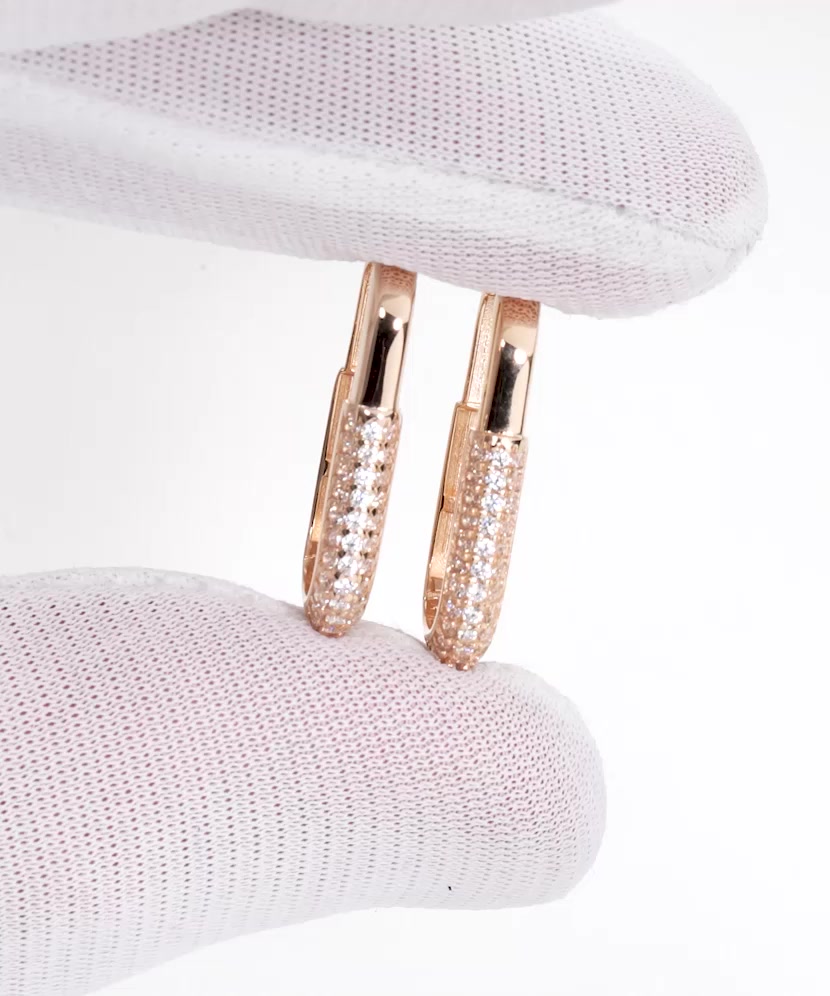 Gold earrings with zircons
