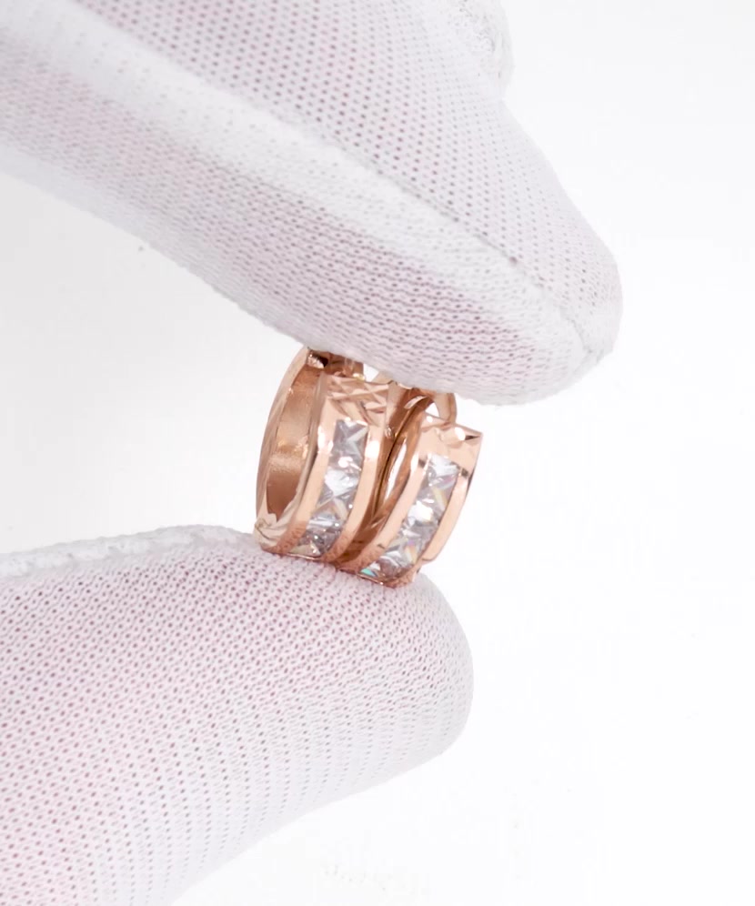 Gold earrings with zircons
