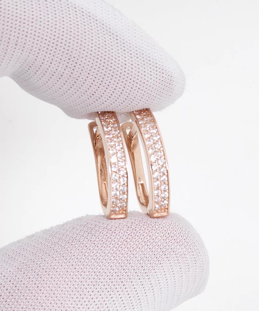 Gold earrings with zircons
