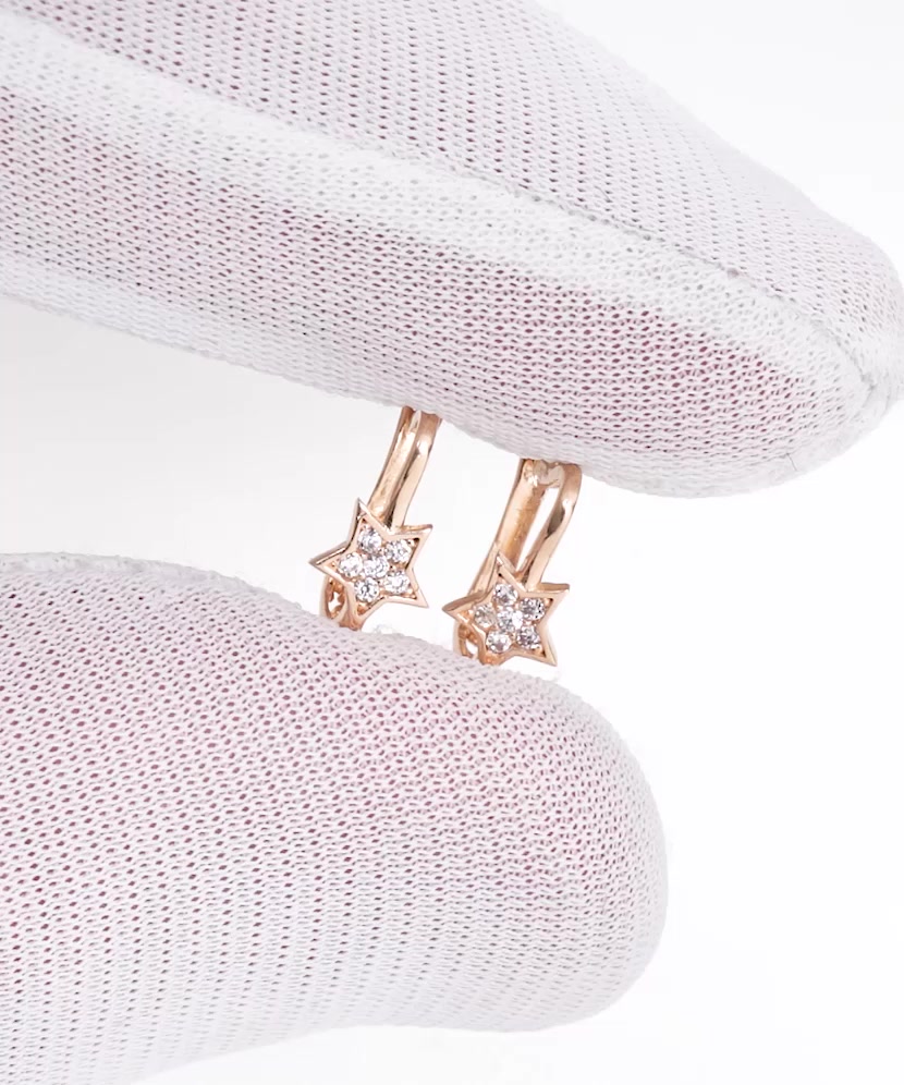 Gold earrings with zircons "star"