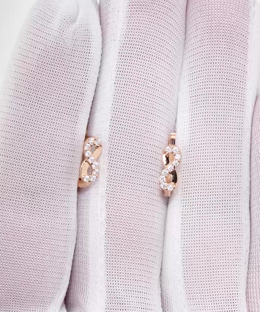 Gold earrings with zircons "infinity"