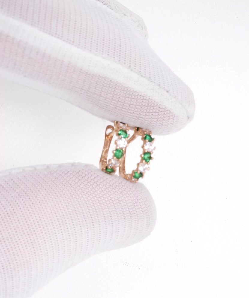 Gold earrings with zircons
