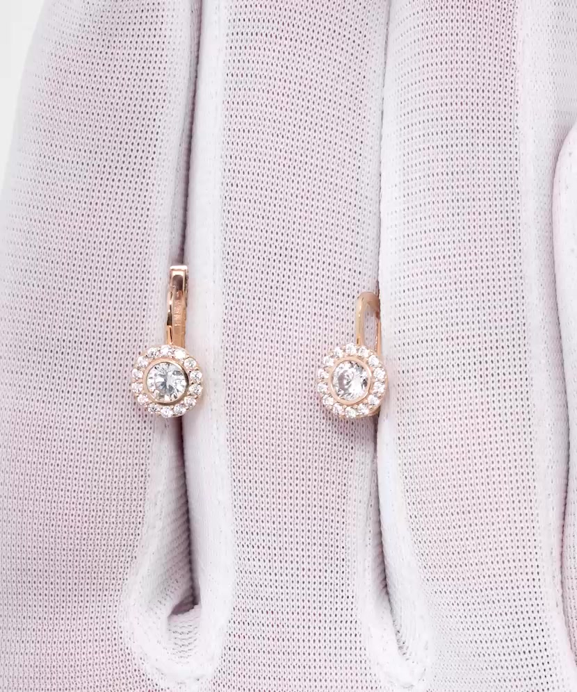 Gold earrings with zircons