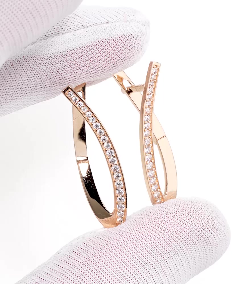 Gold earrings with zircons
