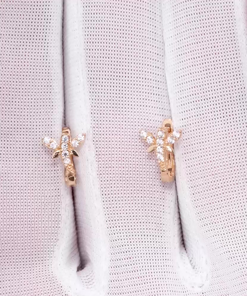 Gold earrings with zircons