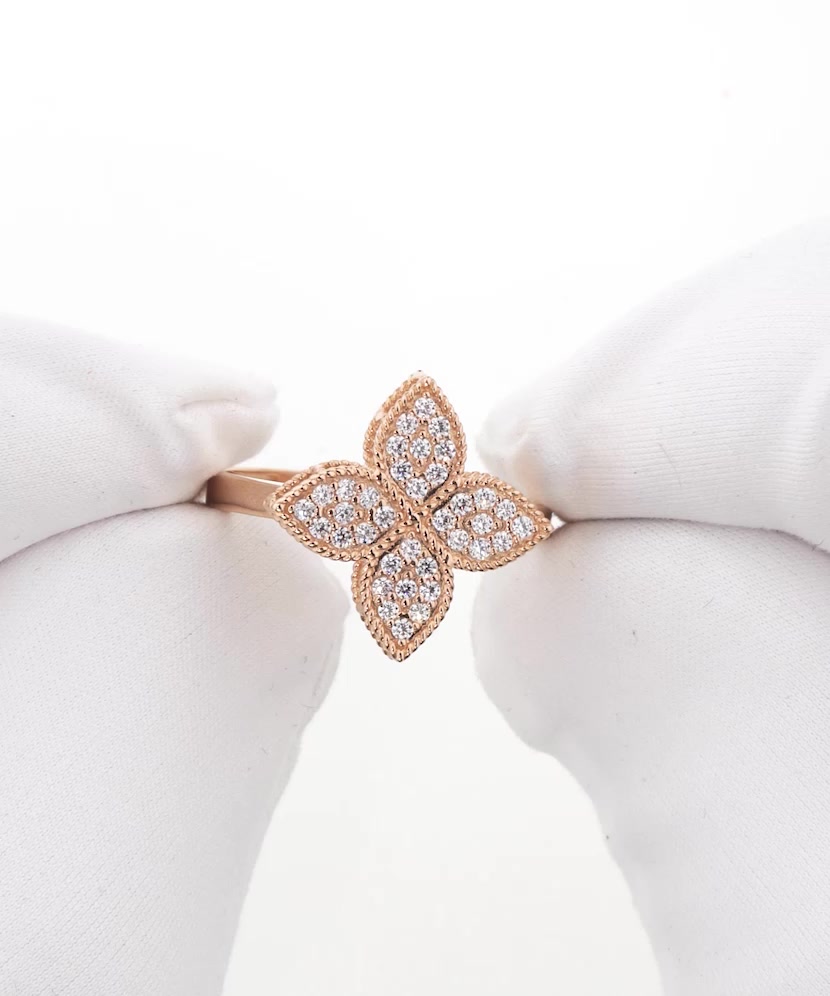 Gold ring with zircons
