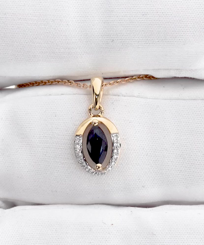 Yellow gold pendant with sapphire and diamonds