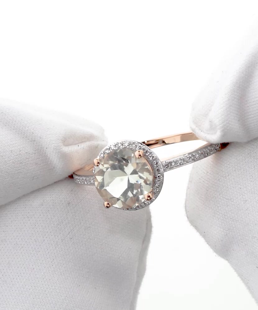 Gold ring with green amethyst and diamonds