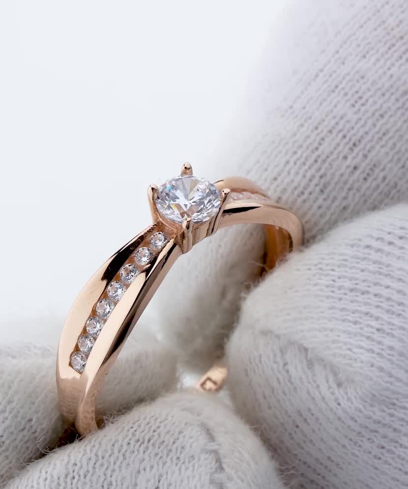 Gold ring with zircons