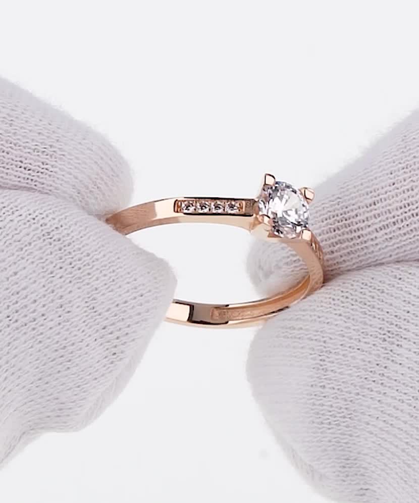 Gold ring with zircons