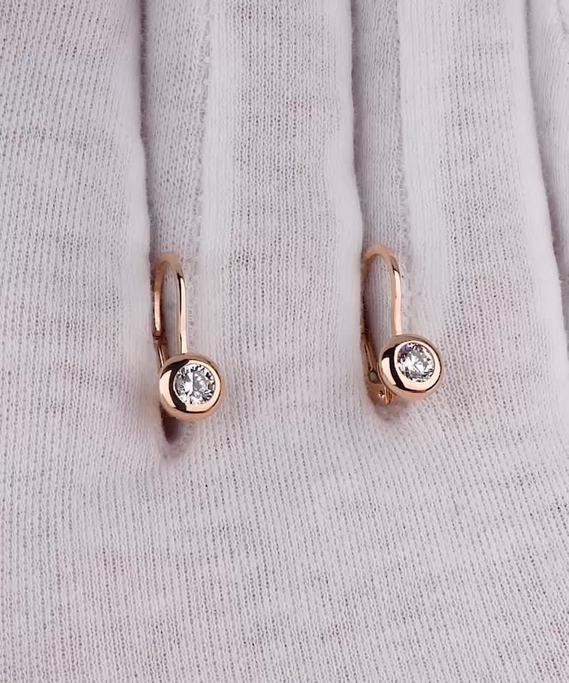 Gold earrings with zircons Gold earrings with zircons