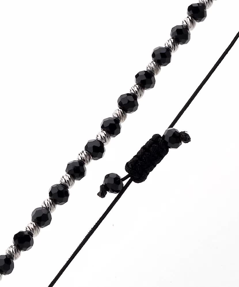 Black string bracelet with silver and onyxes
