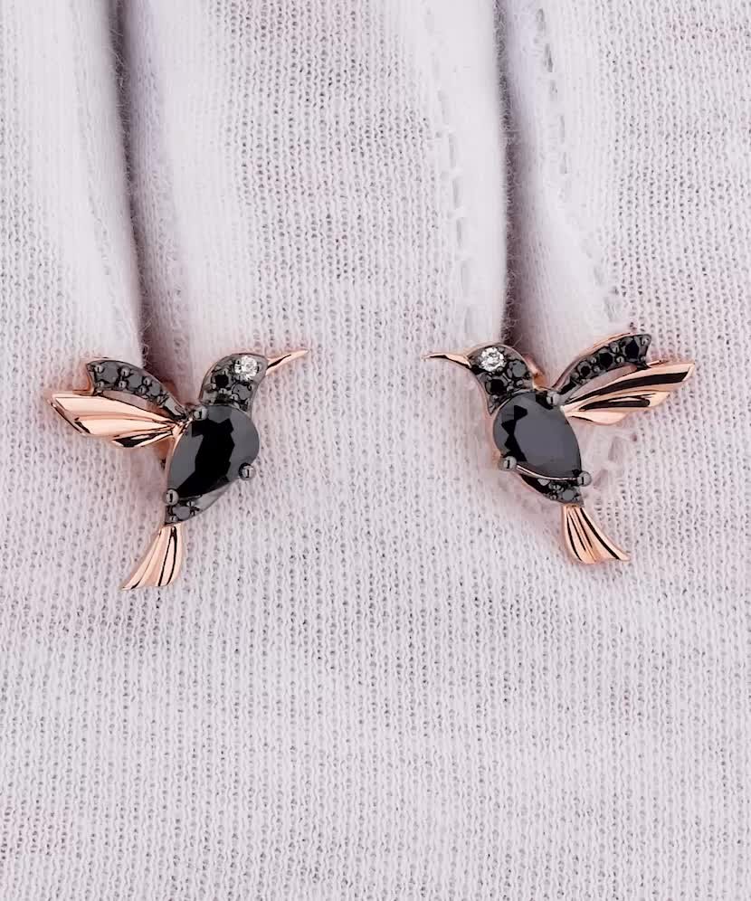 Gold earrings with black diamonds