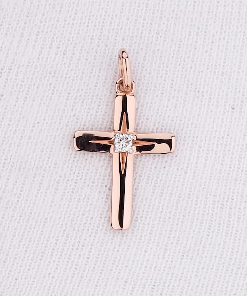 Gold pendant with diamond "cross"