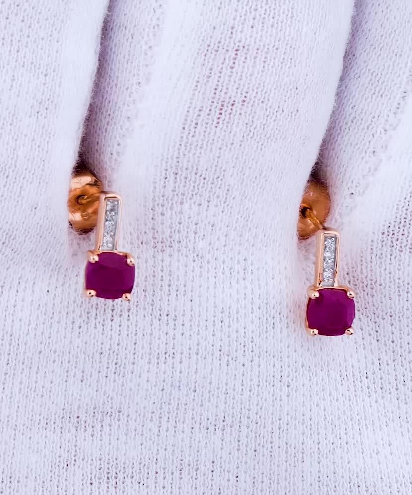 Gold earrings with rubies and diamonds