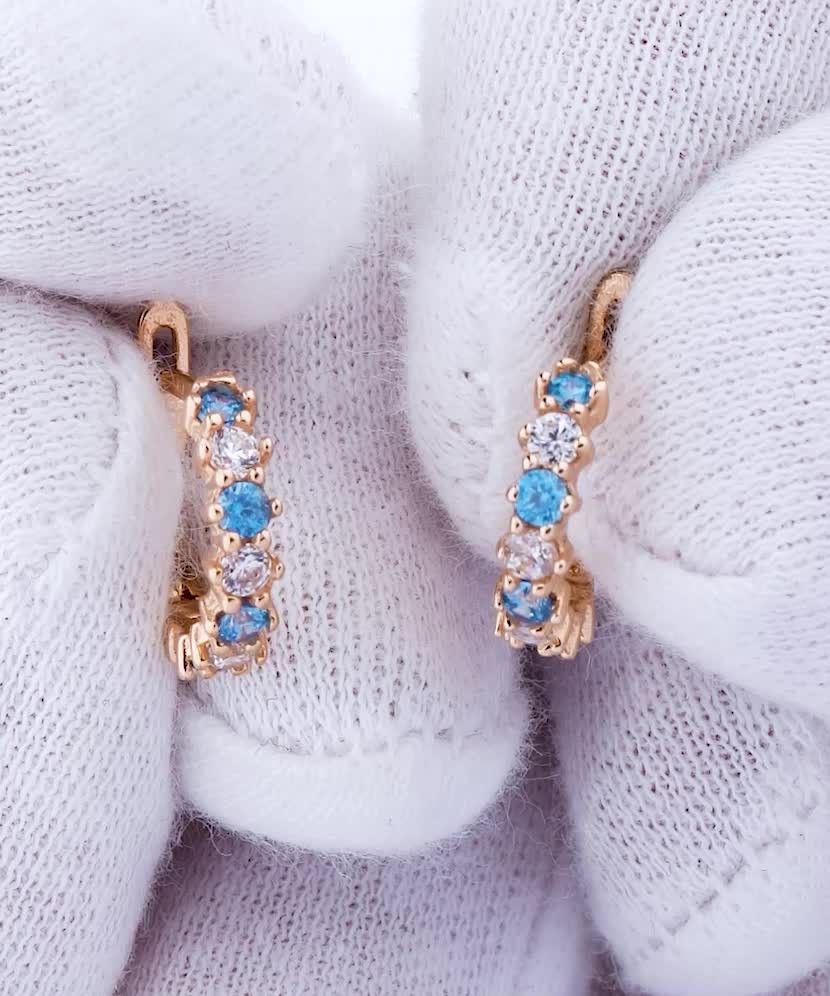 Gold children's earrings with zircons
