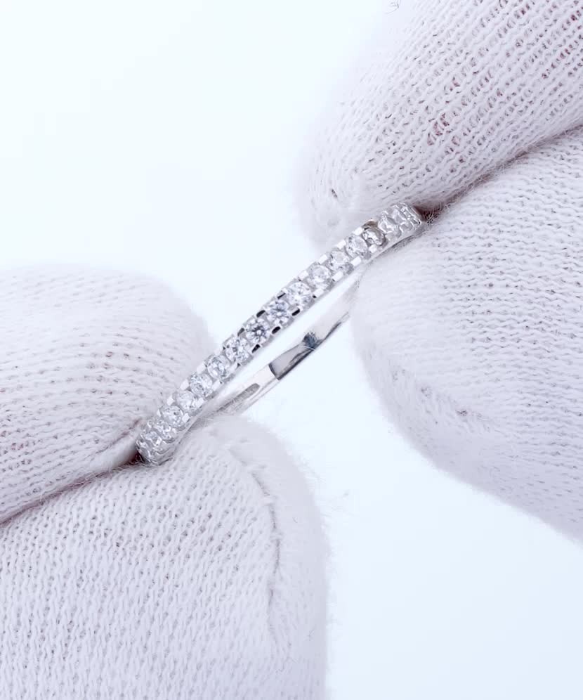 White gold ring with zircons