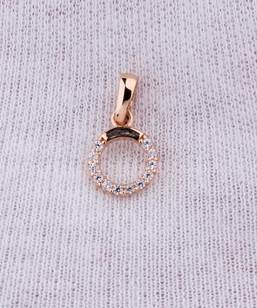 Gold pendant with zircons