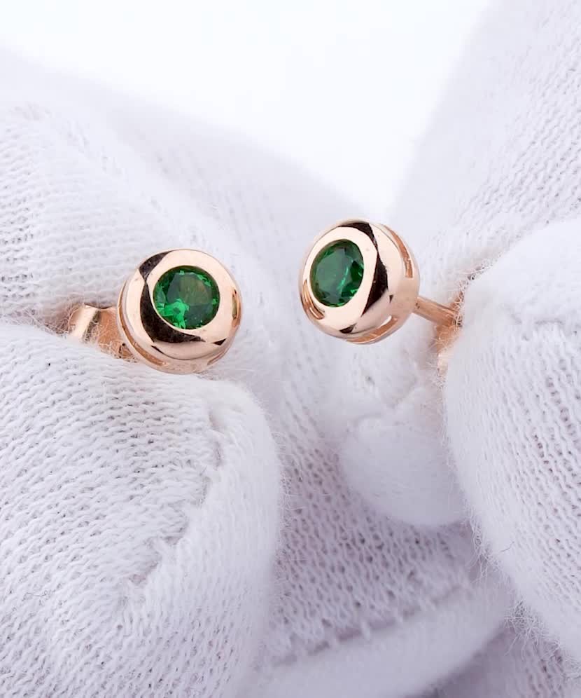 Gold earrings with zircons