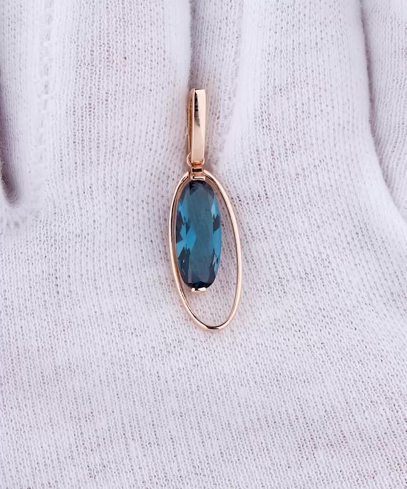 Gold pendant with london topaz