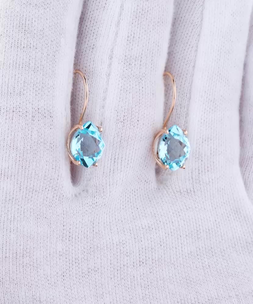 Gold earrings with london topaz
