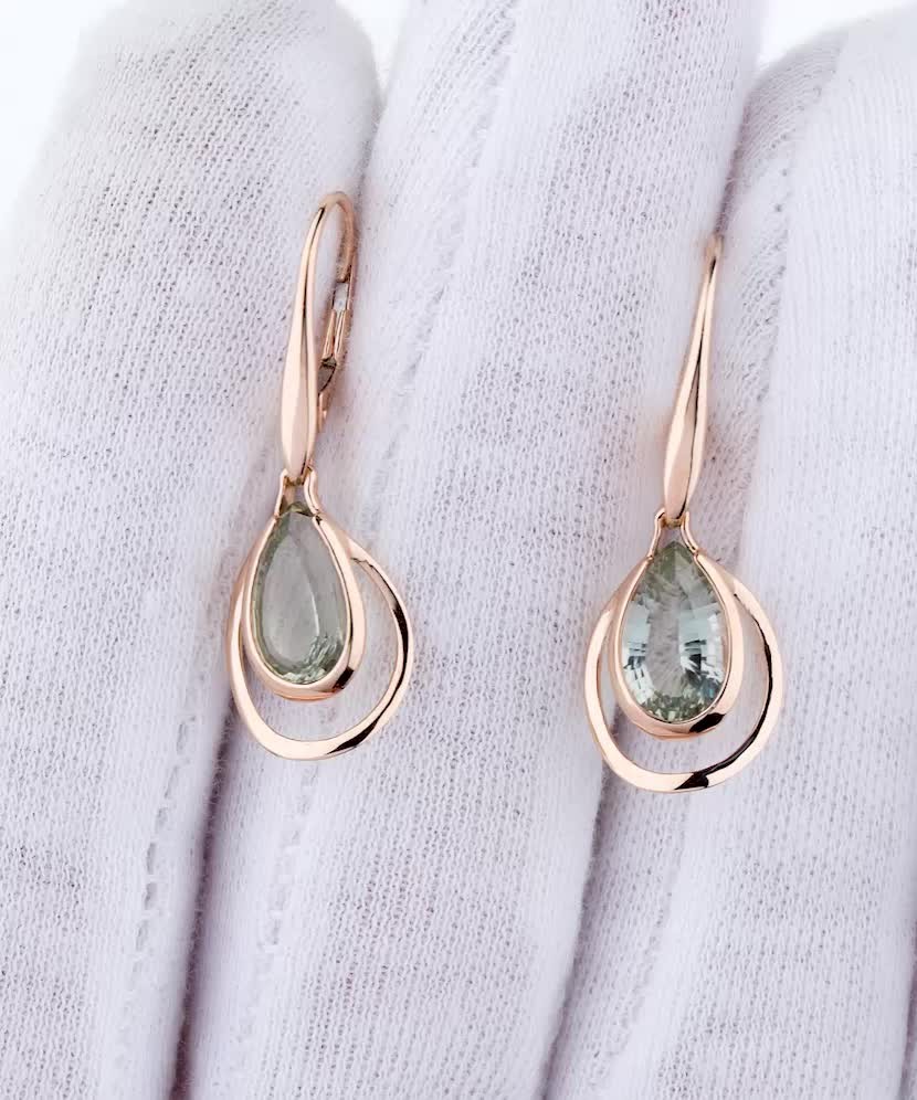 Gold earrings with green amethysts