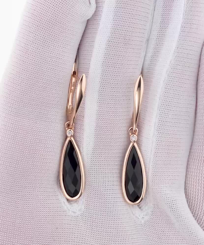 Gold earrings with black agates and diamonds
