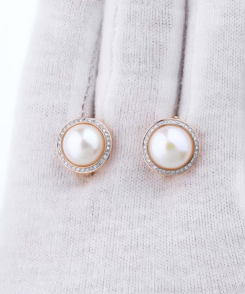 Серьги из золота с бриллиантами и жемчугом Серьги из золота с бриллиантами и жемчугом