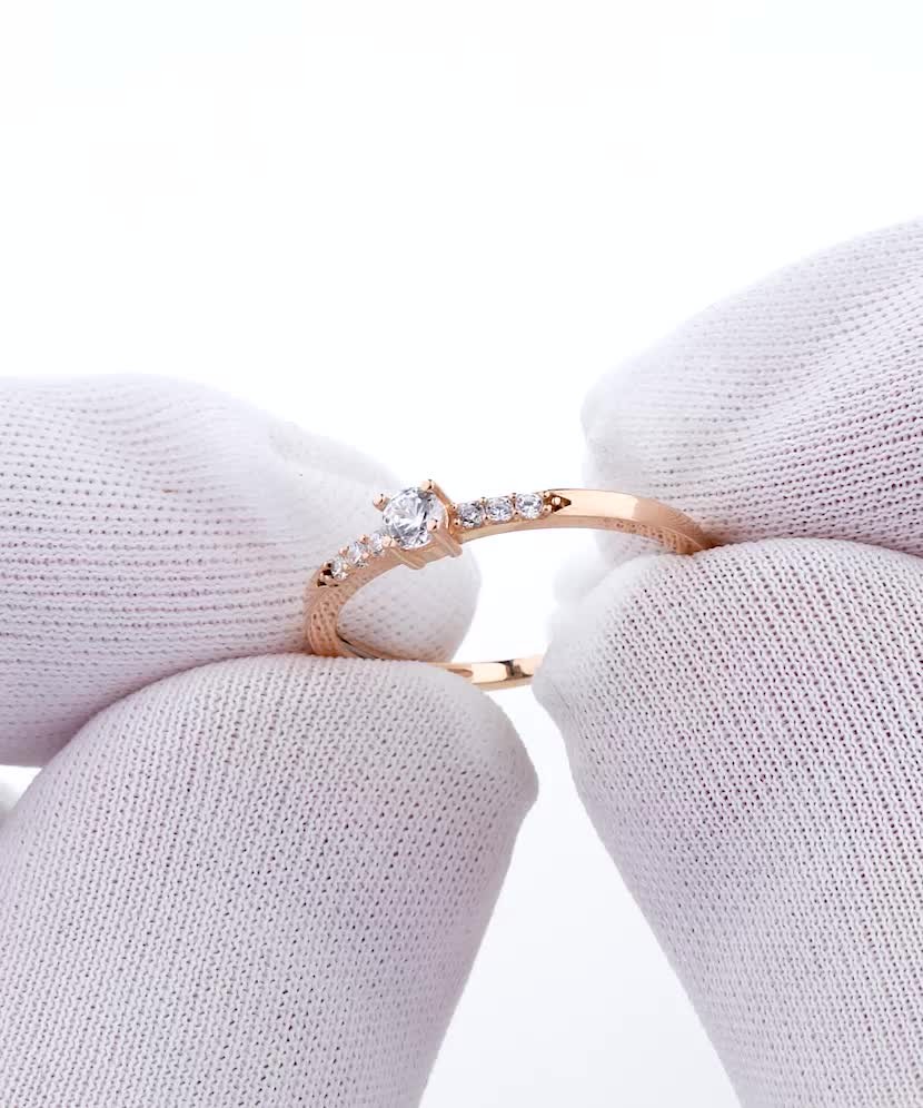 Gold ring with zircons