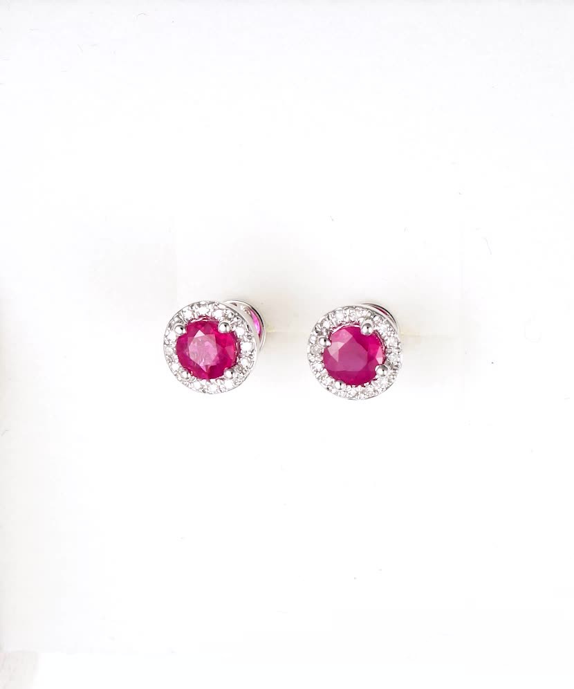 White gold earrings with rubies and diamonds White gold earrings with rubies and diamonds