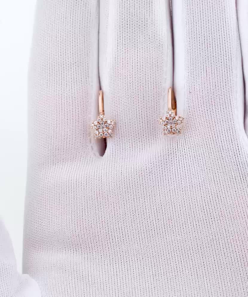 Gold earrings with zircons