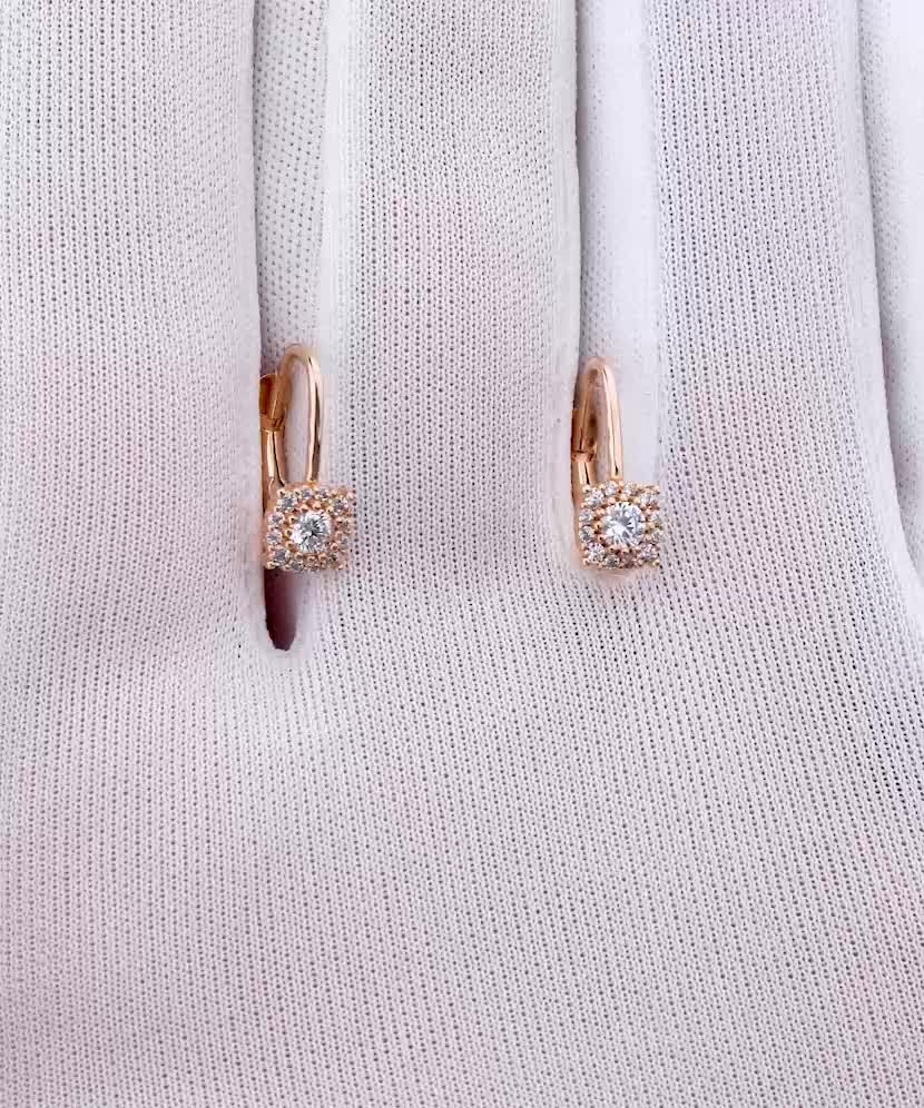 Gold earrings with zircons