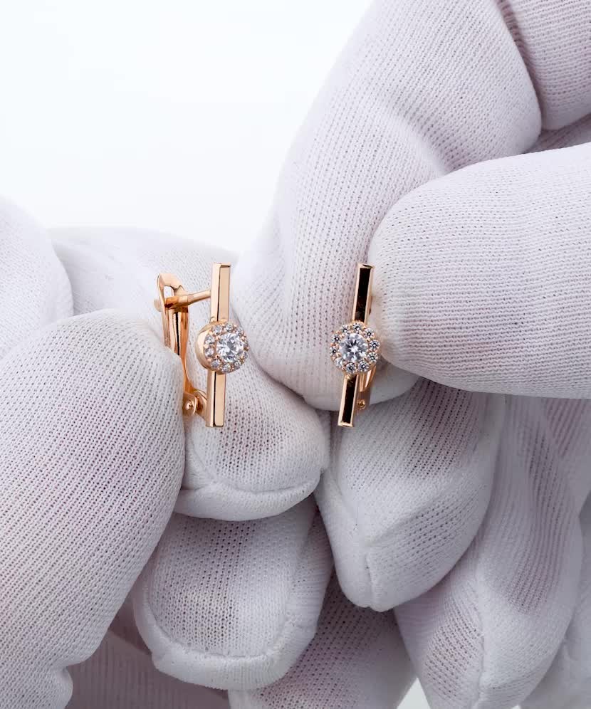 Gold earrings with zircons