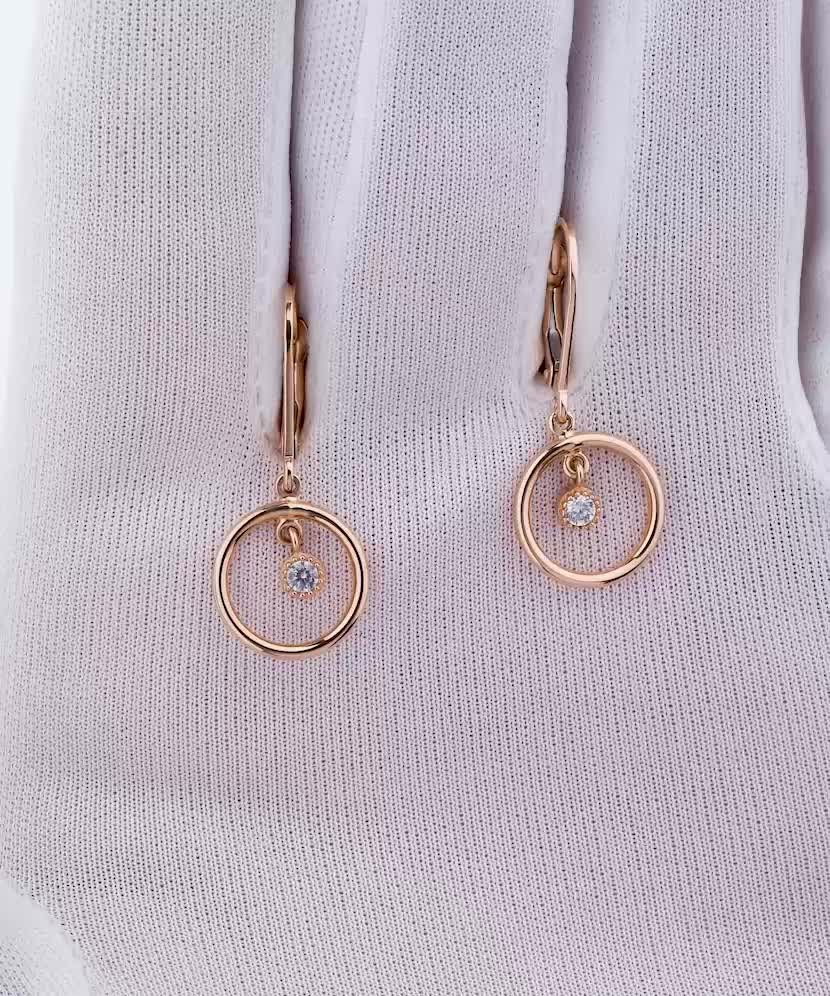 Gold earrings with zircons