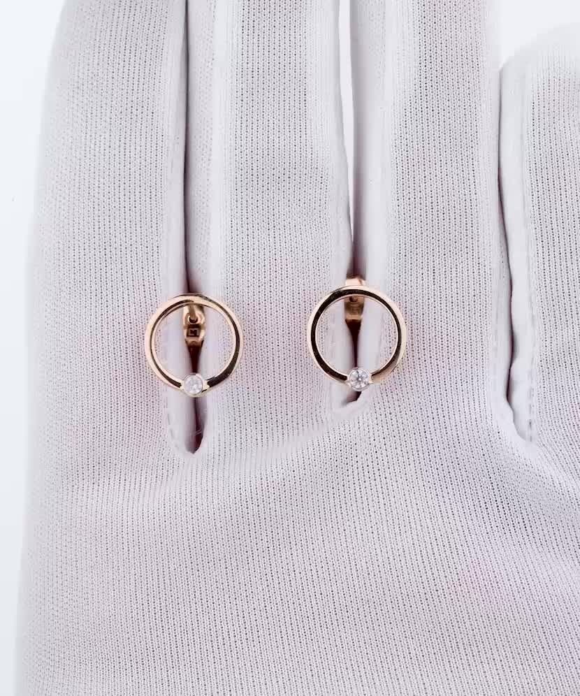 Gold earrings with zircons